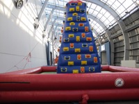 Inflatable rock-climbing tower